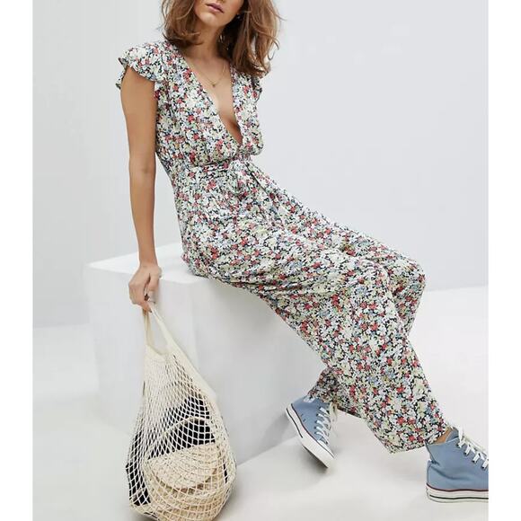 Free People Ruffle Your Feathers Print Jumpsuit Deep V Neck Pockets XS Boho - Picture 3 of 13